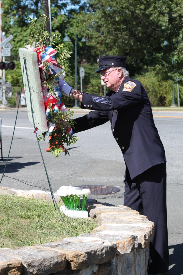 Flower placed for John Foran by Bob Lacy.

Memorial Service NFD. September 9, 2012. Photo by Vincent P. Tuzzolino